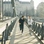 depositphotos_211950570-stock-photo-young-couple-running-urban-enviroment